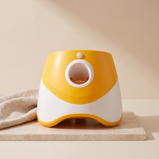 Automatic tennis ball launcher for dogs, three-quarter view